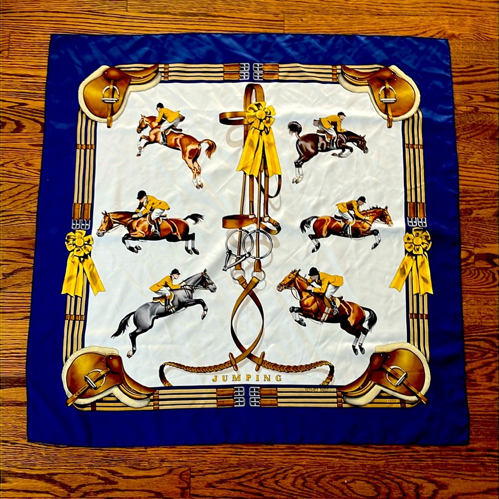 Hermes scarf. “Jumping.” Never worn. Perfect condition. 35” x 35” 100% silk.